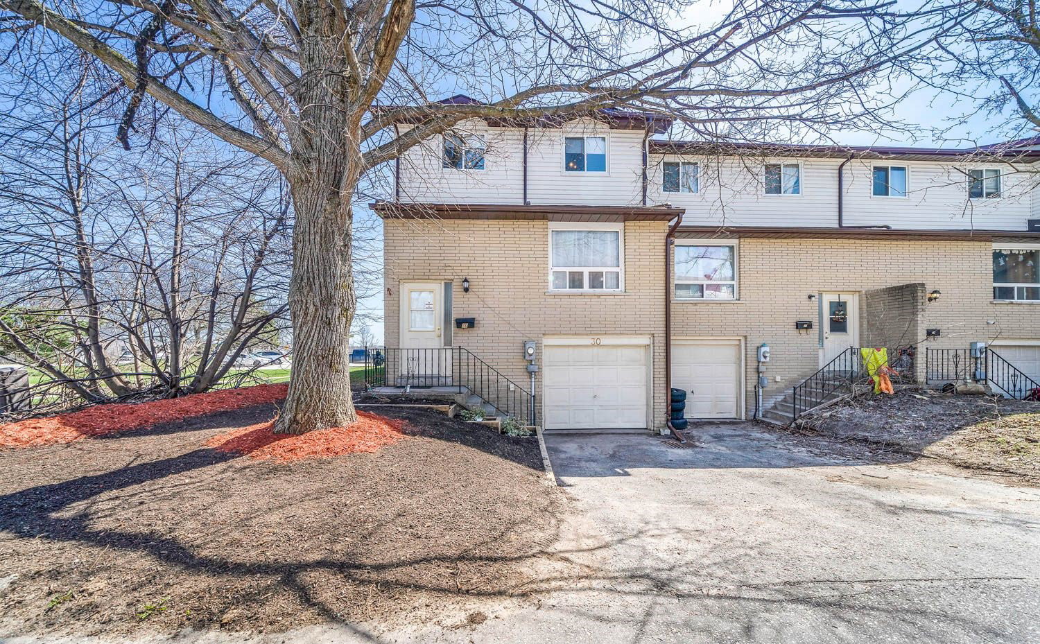 Village Green Townhouses condo building exterior