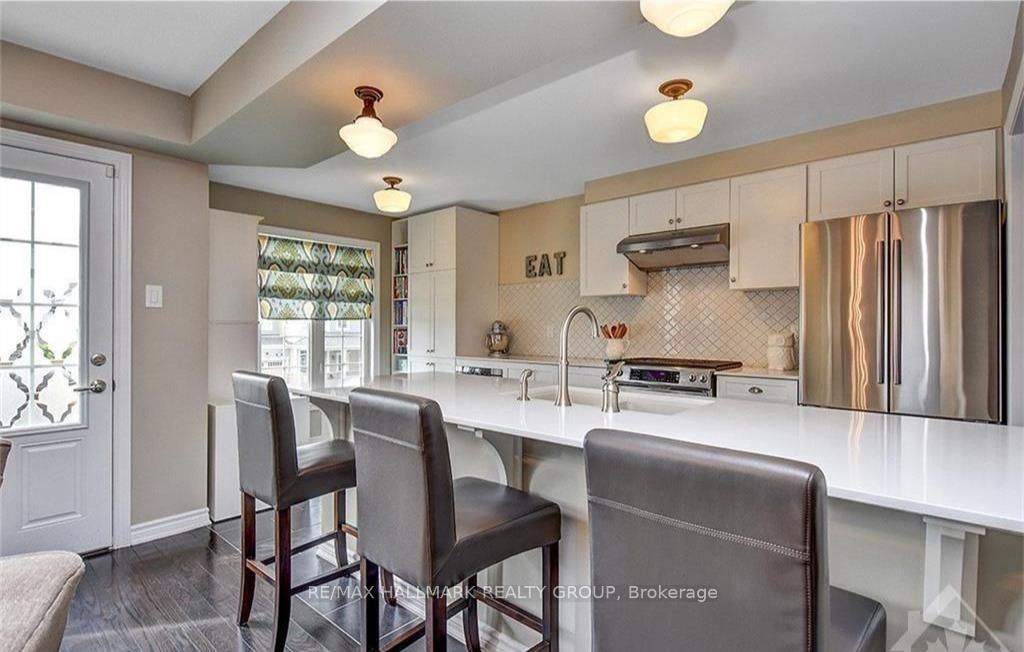 Photo 7 of 445 Meadowhawk Crescent, Ottawa, Barrhaven - Half Moon Bay — HOMEH