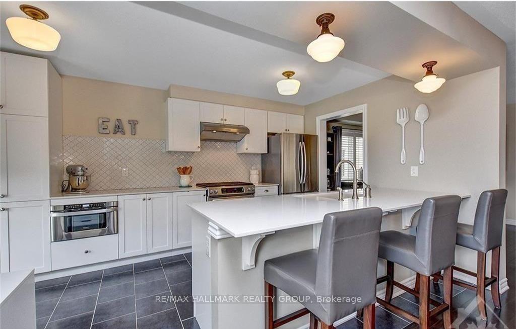 Photo 8 of 445 Meadowhawk Crescent, Ottawa, Barrhaven - Half Moon Bay — HOMEH