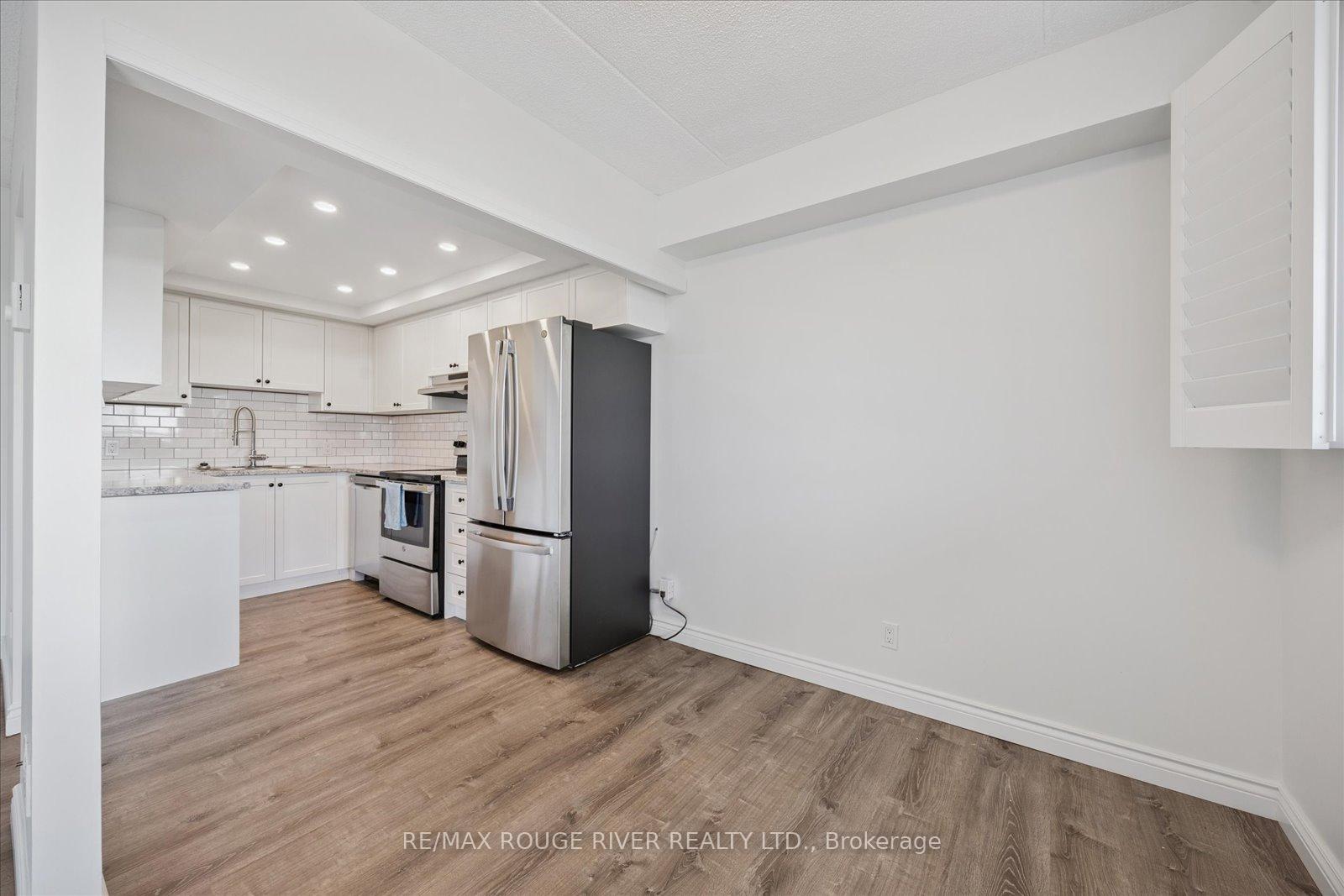 Photo 6 of Unit 601, 144 Queen Street, Clarington, Bowmanville — HOMEH