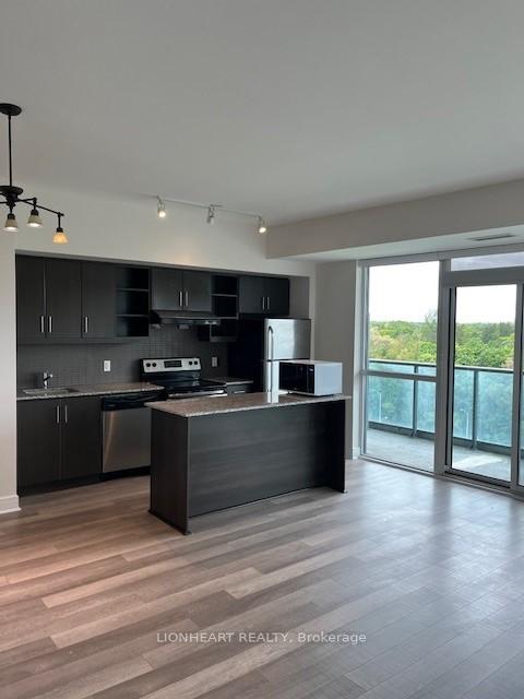 Photo 4 of Unit 704, 35 Brian Peck Crescent, Toronto, Thorncliffe Park — HOMEH