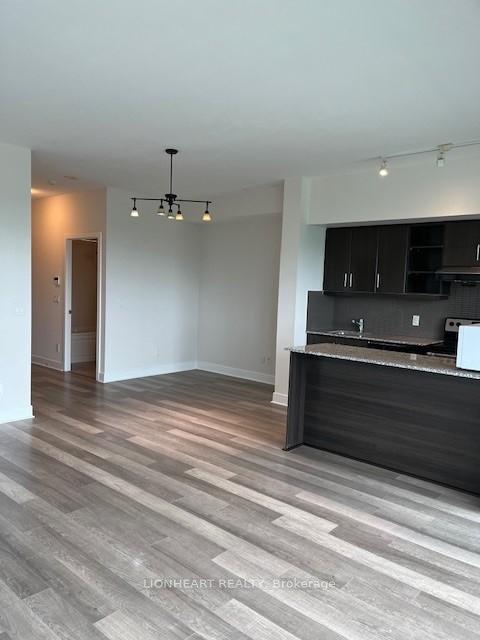 Photo 5 of Unit 704, 35 Brian Peck Crescent, Toronto, Thorncliffe Park — HOMEH