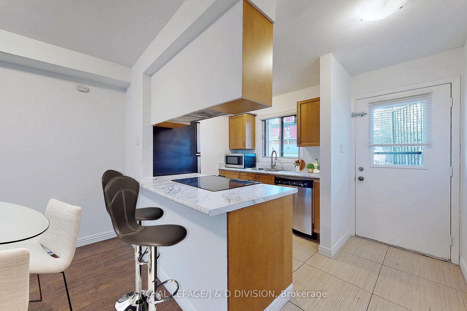 Photo 4 of Unit Th#10, 1209 Queen Street, Toronto, South Riverdale — HOMEH