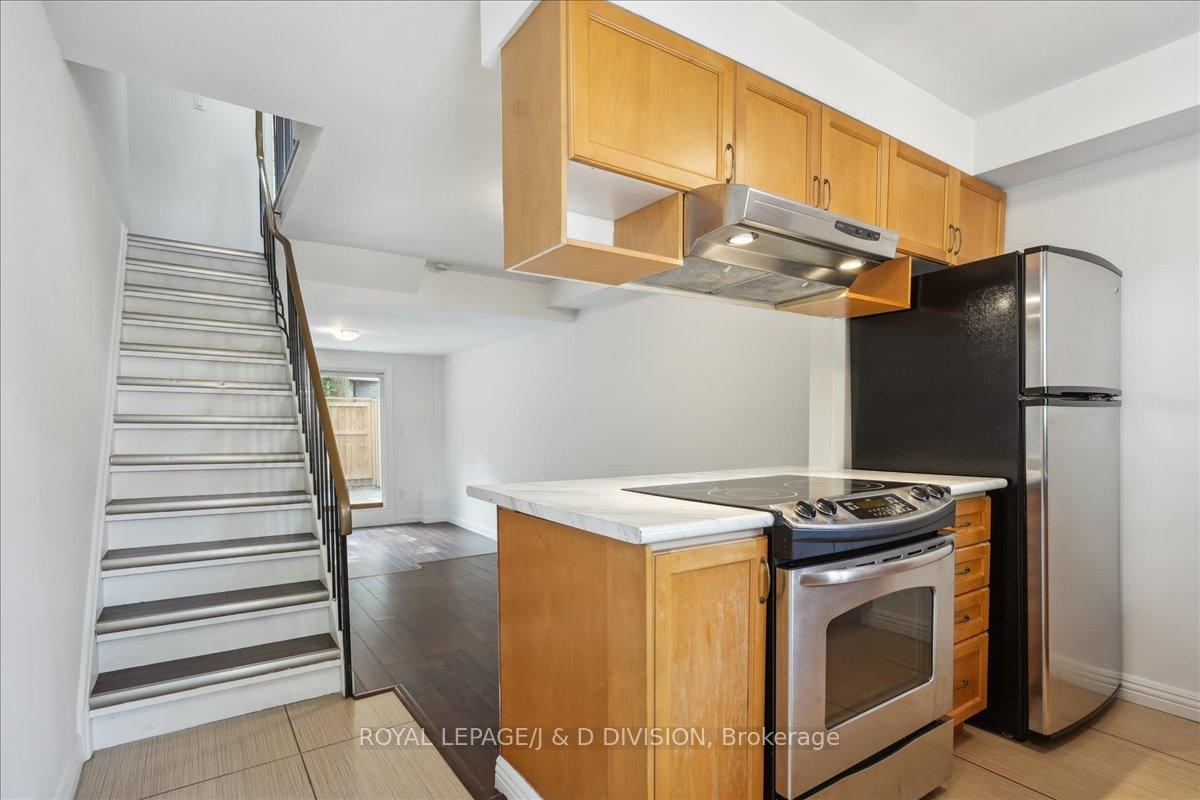 Photo 5 of Unit Th#10, 1209 Queen Street, Toronto, South Riverdale — HOMEH