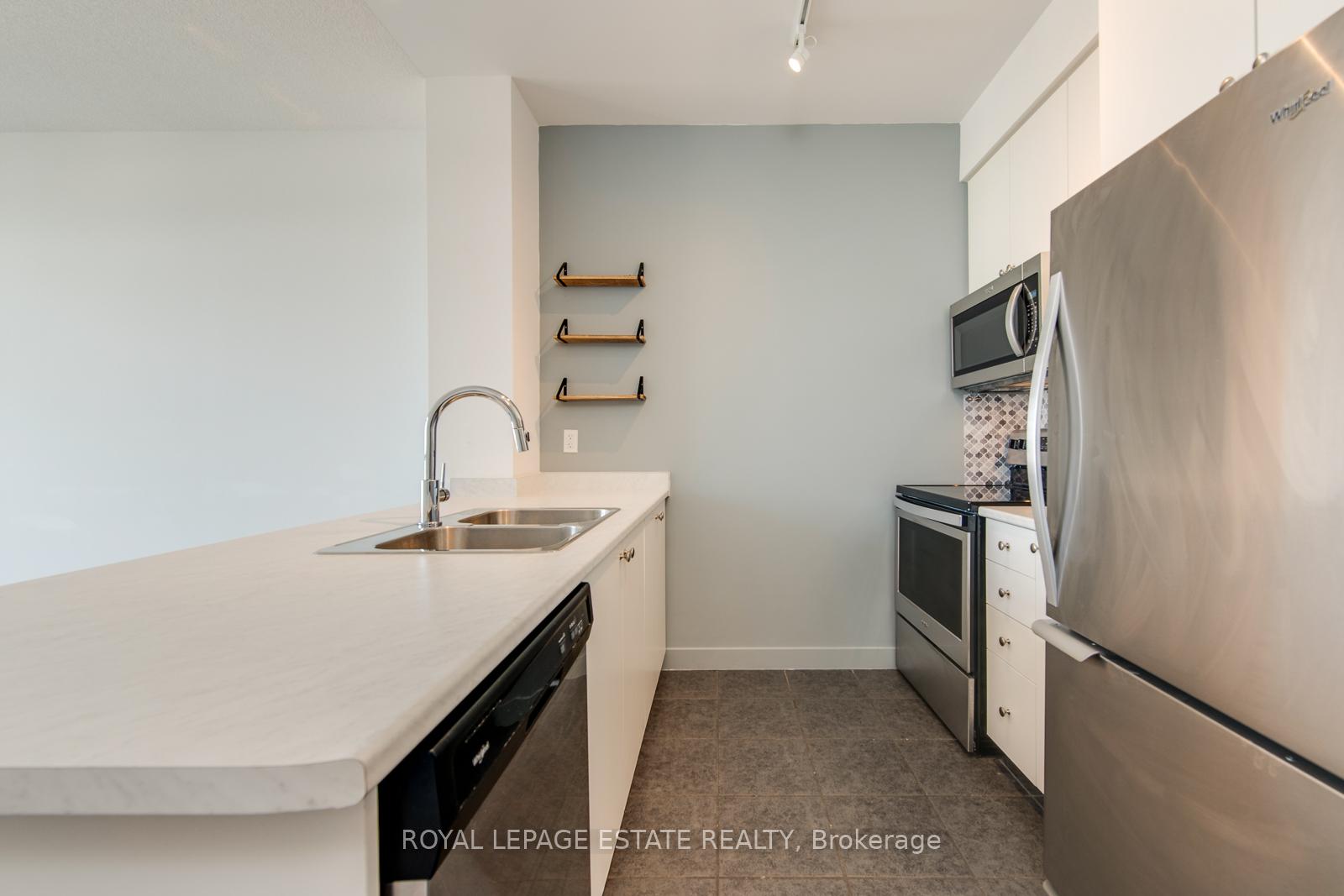 Photo 2 of Unit 1212, 8 Trent Avenue, Toronto, East End-Danforth — HOMEH