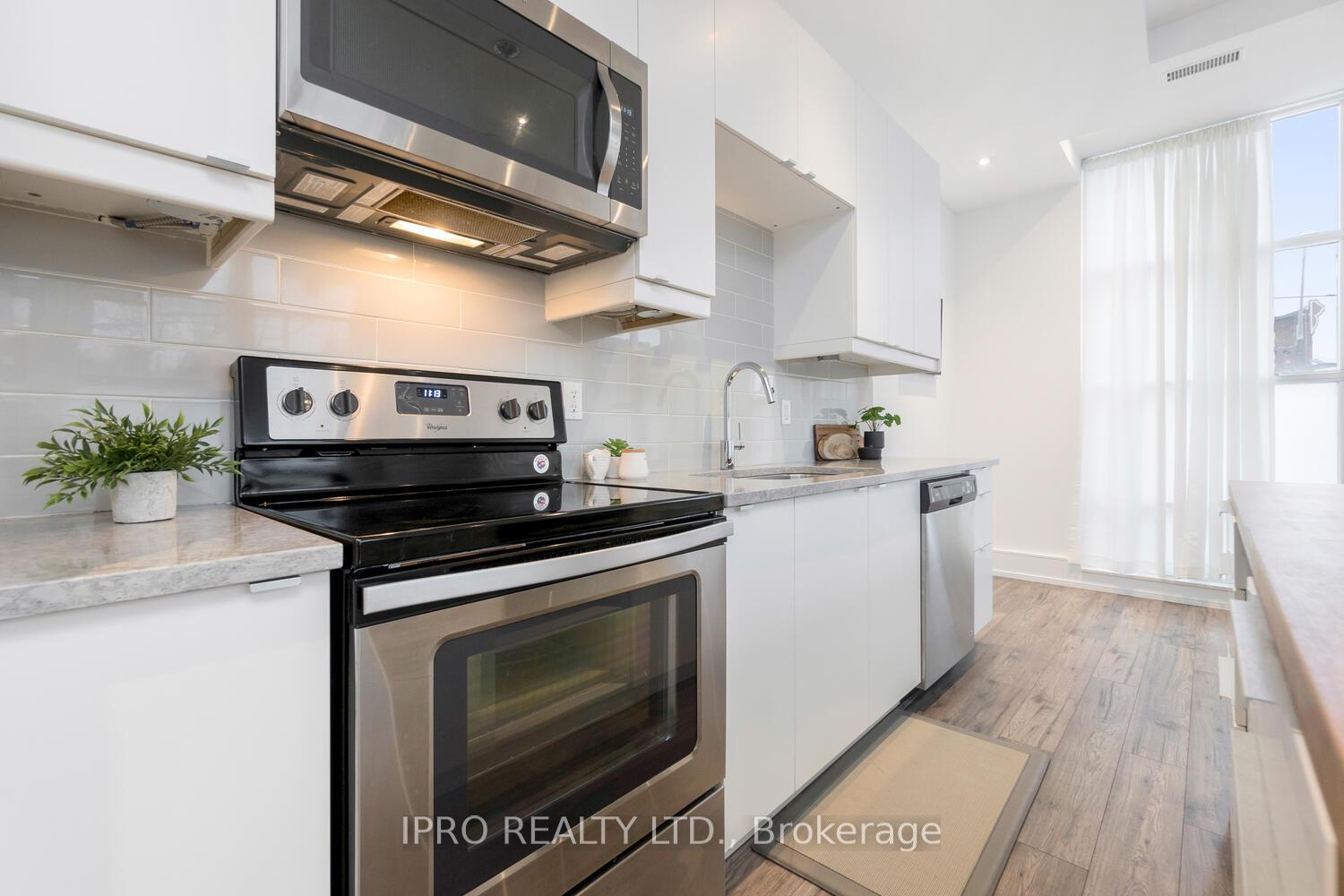 Photo 7 of Unit 201, 1003 Queen Street E, Toronto, South Riverdale — HOMEH