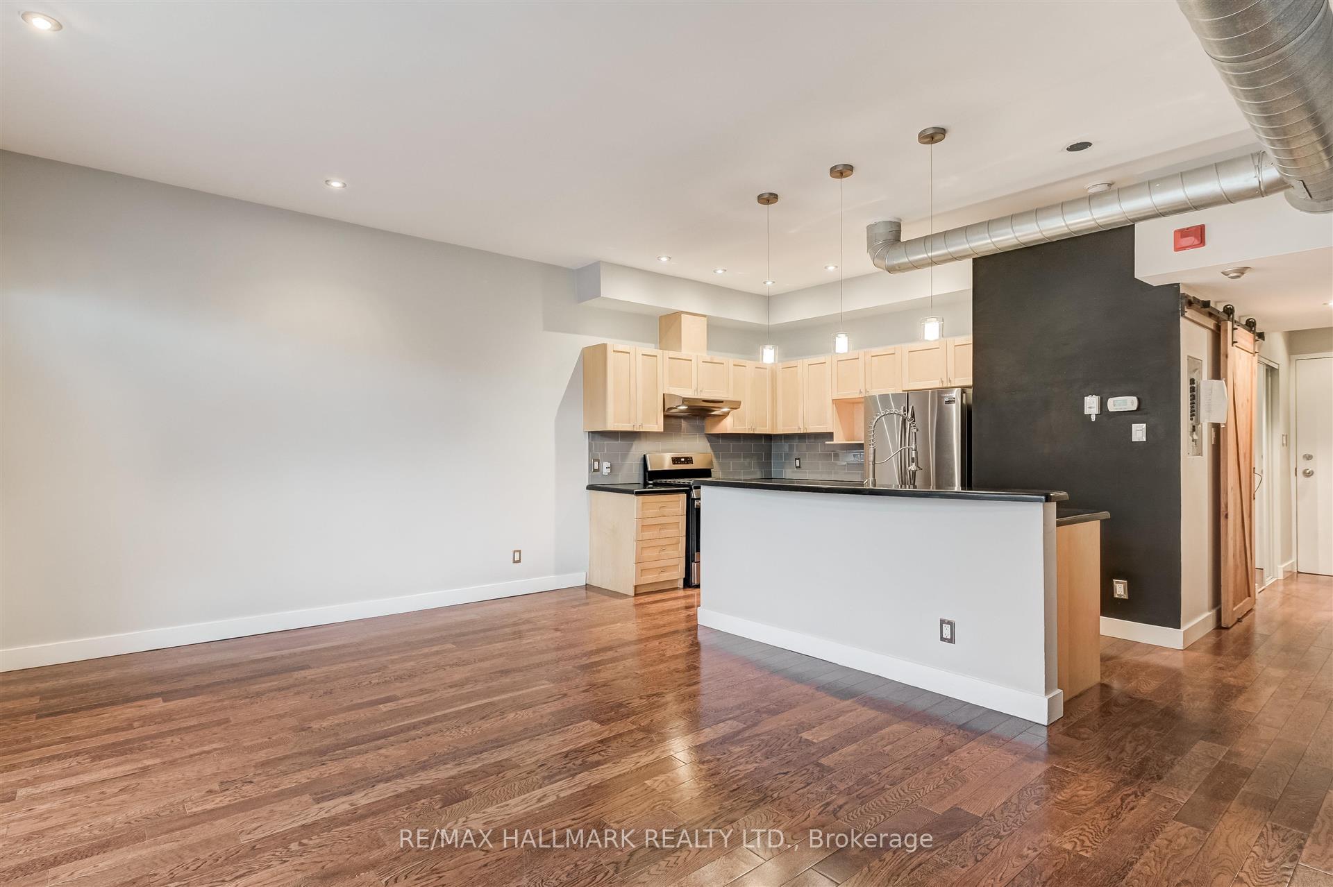 Photo 3 of Unit 8, 2362 Queen Street E, Toronto, The Beaches — HOMEH
