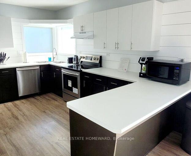 Photo 3 of 340 Fifth Street, Cochrane — HOMEH