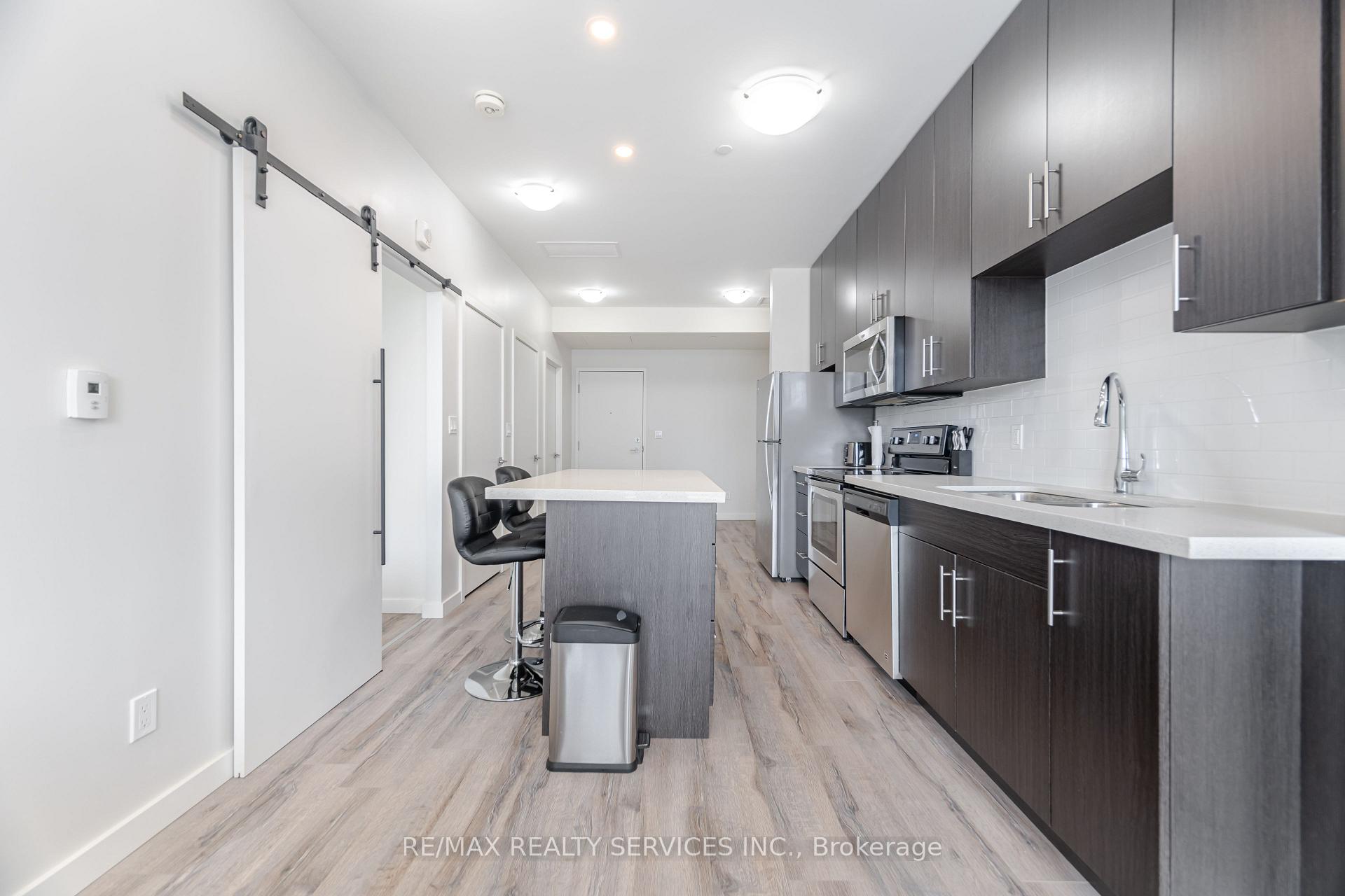 Photo 51 of Unit 311, 690 King Street W, Kitchener — HOMEH