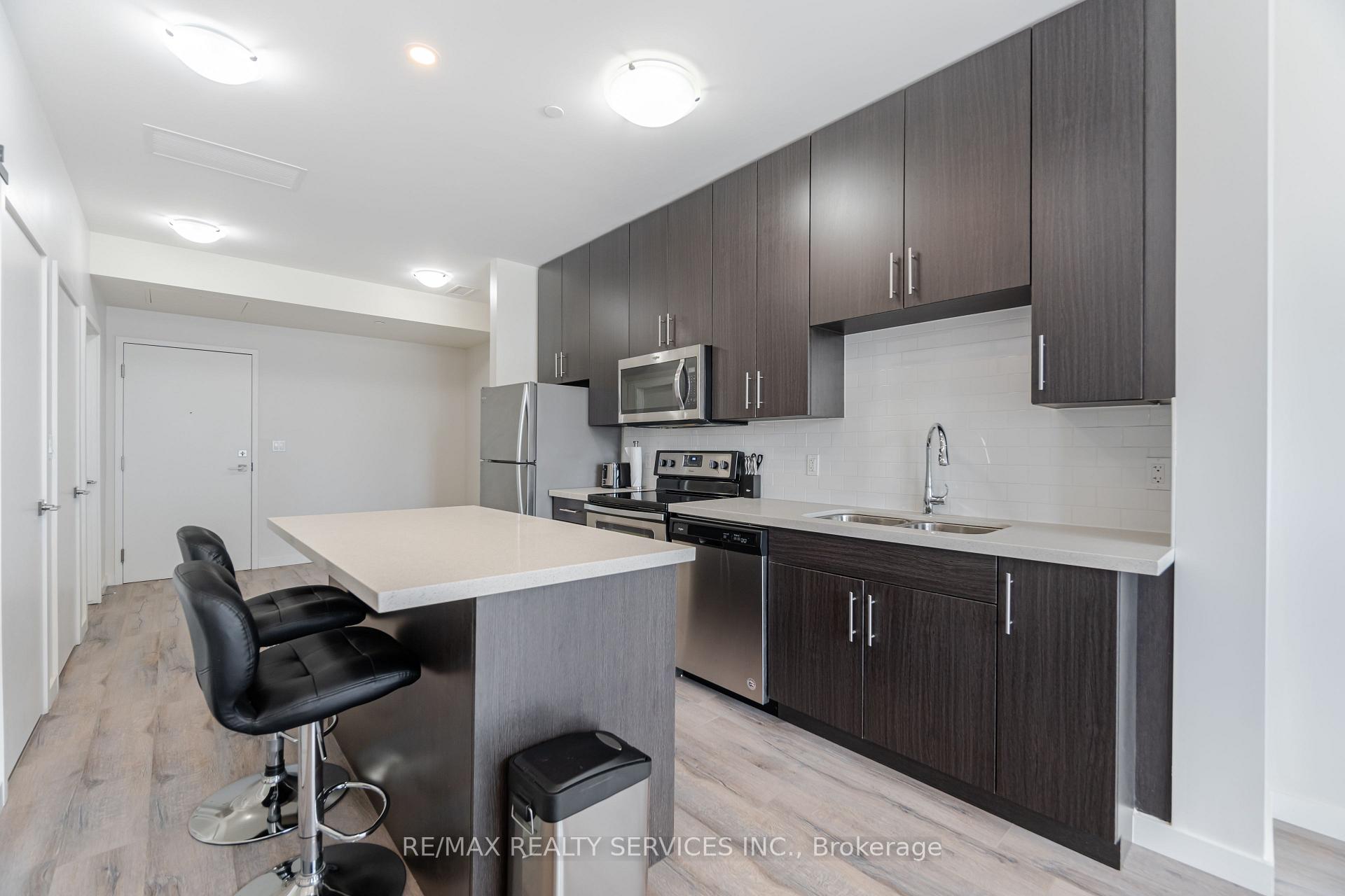 Photo 12 of Unit 311, 690 King Street W, Kitchener — HOMEH