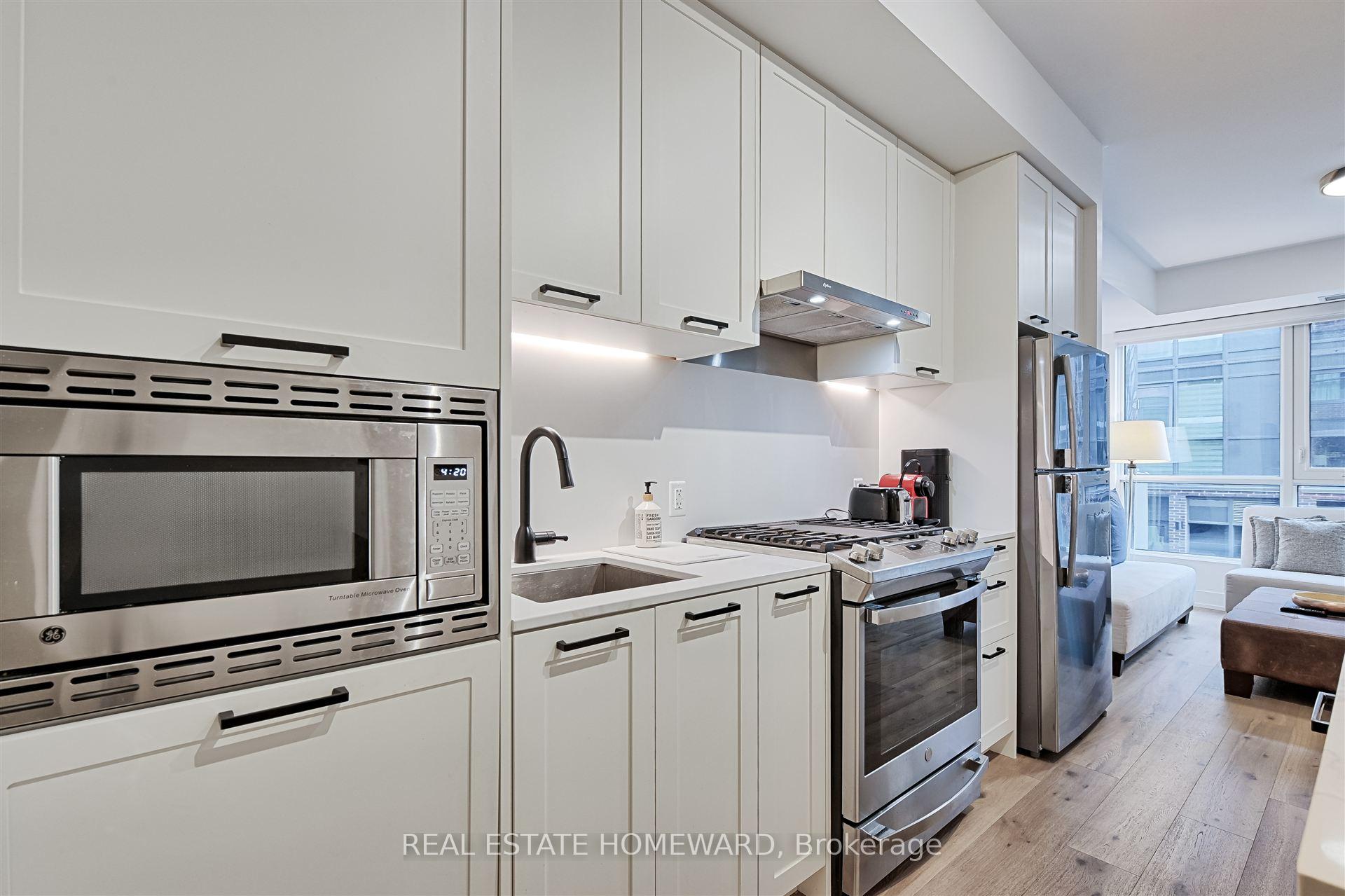 Photo 6 of Unit 203, 1331 Queen Street E, Toronto, Greenwood-Coxwell — HOMEH