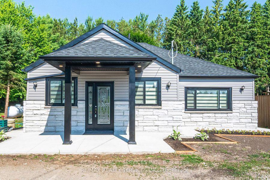 Front of 8772 Wellington 124 Road W