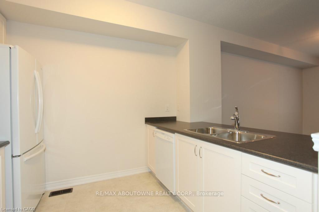 Photo 10 of Unit 104, 1401 Plains Road E, Burlington, Freeman — HOMEH