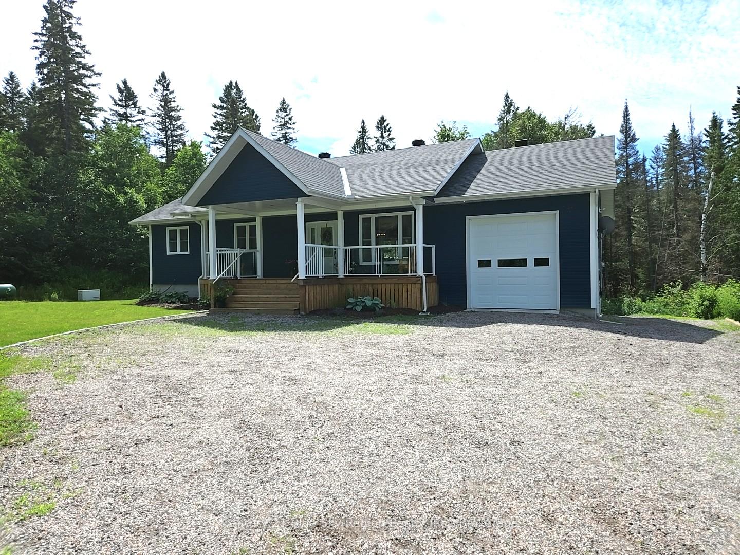 Photo 2 of 635 Chiswick Line, Powassan — HOMEH