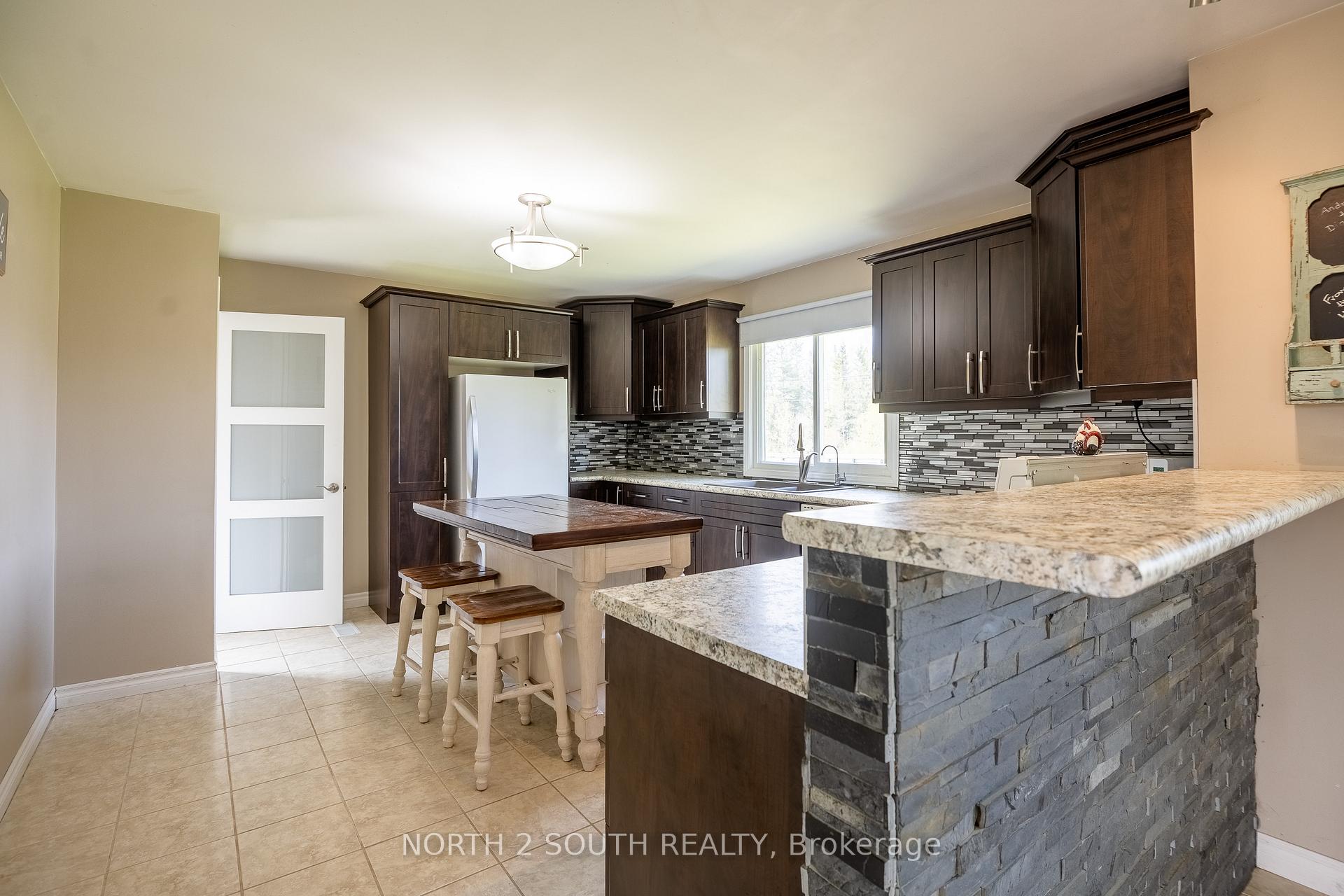 Photo 11 of 335147 Hwy 11 N, Englehart, Central Timiskaming — HOMEH
