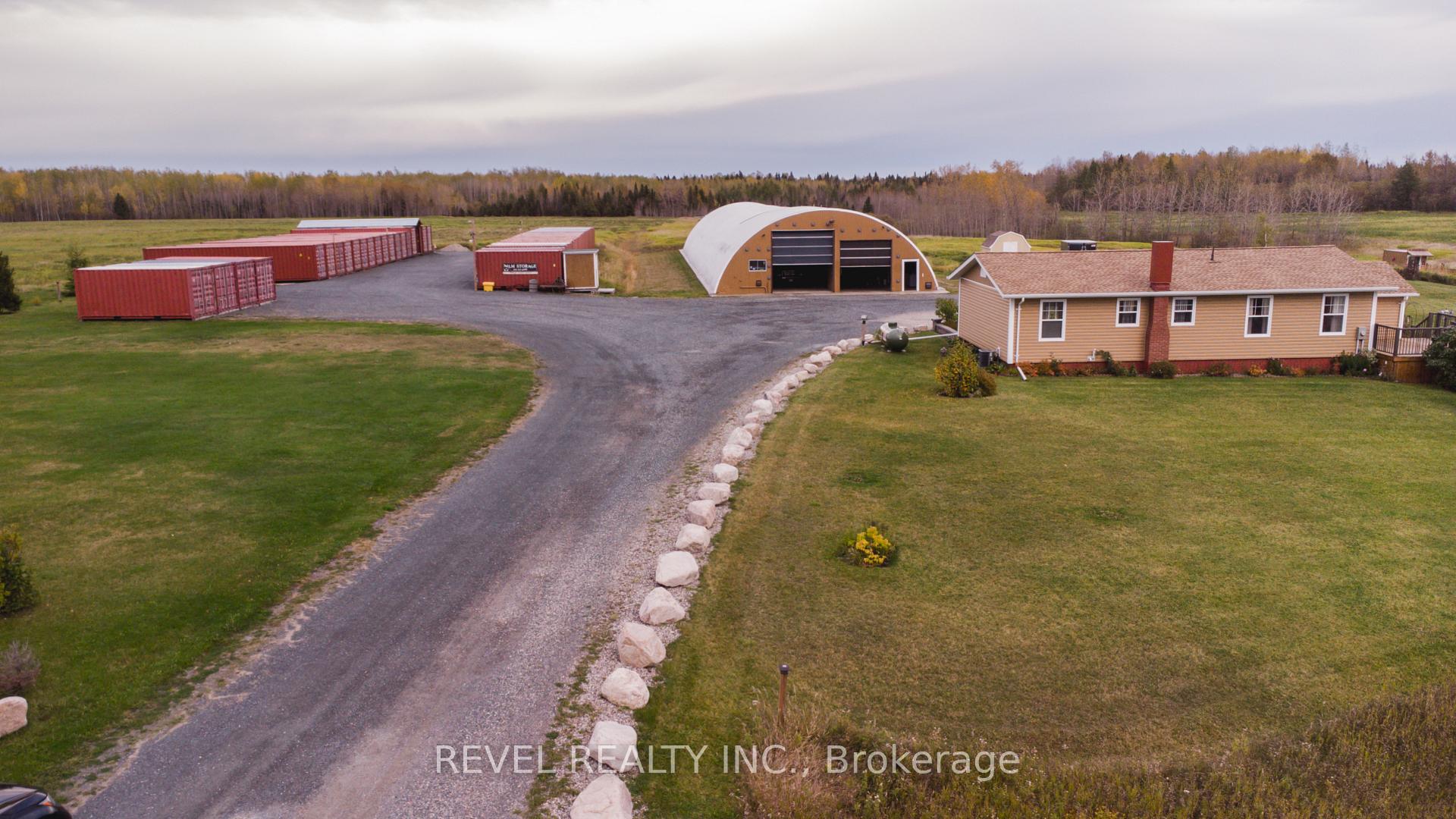 Photo 1 of 1356 Highway 11 S, Cochrane — HOMEH
