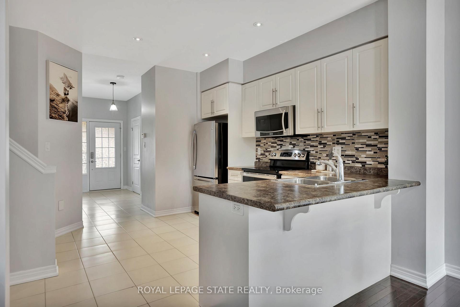 Photo 10 of Unit 29, 45 Royal Winter Drive, Hamilton, Binbrook — HOMEH