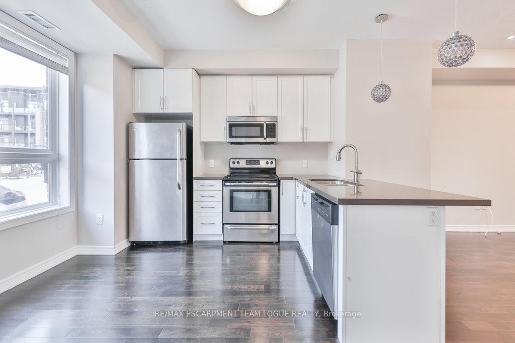 Photo 8 of Unit 7, 5030 Corporate Drive, Burlington, Uptown — HOMEH