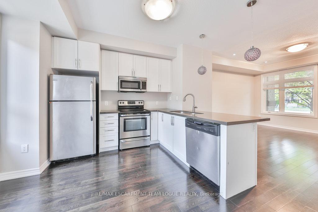 Photo 9 of Unit 7, 5030 Corporate Drive, Burlington, Uptown — HOMEH
