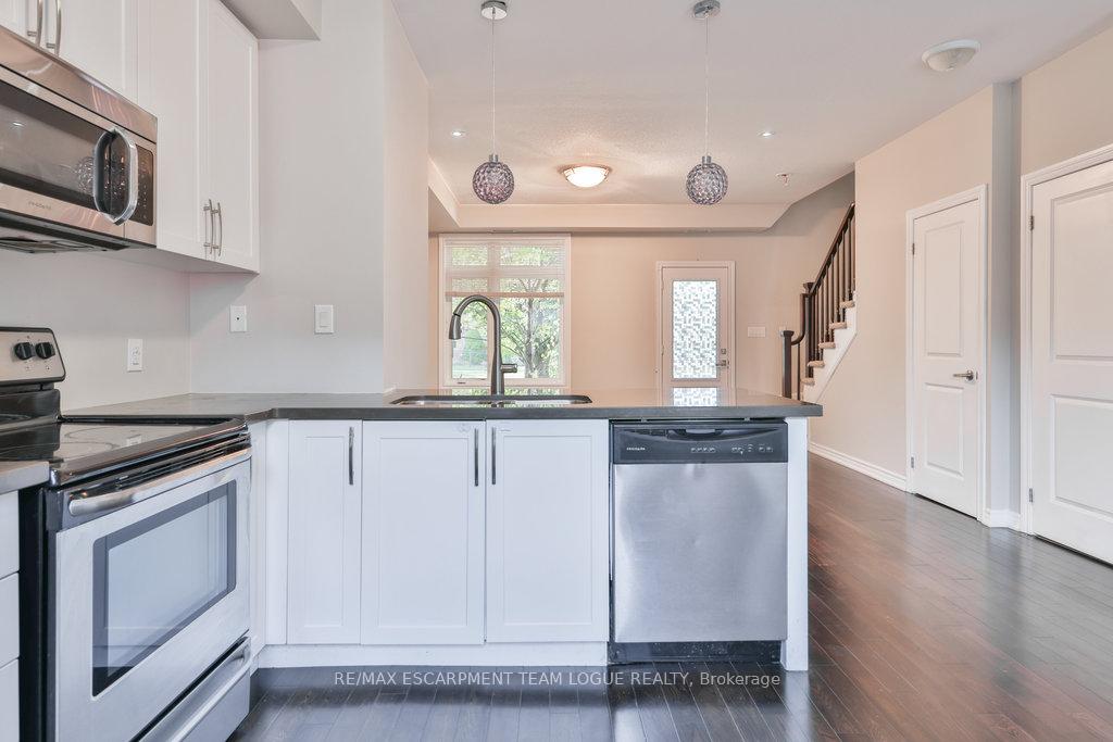 Photo 10 of Unit 7, 5030 Corporate Drive, Burlington, Uptown — HOMEH