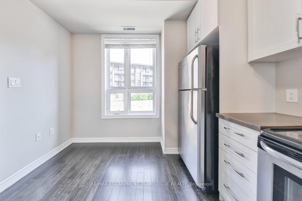 Photo 11 of Unit 7, 5030 Corporate Drive, Burlington, Uptown — HOMEH