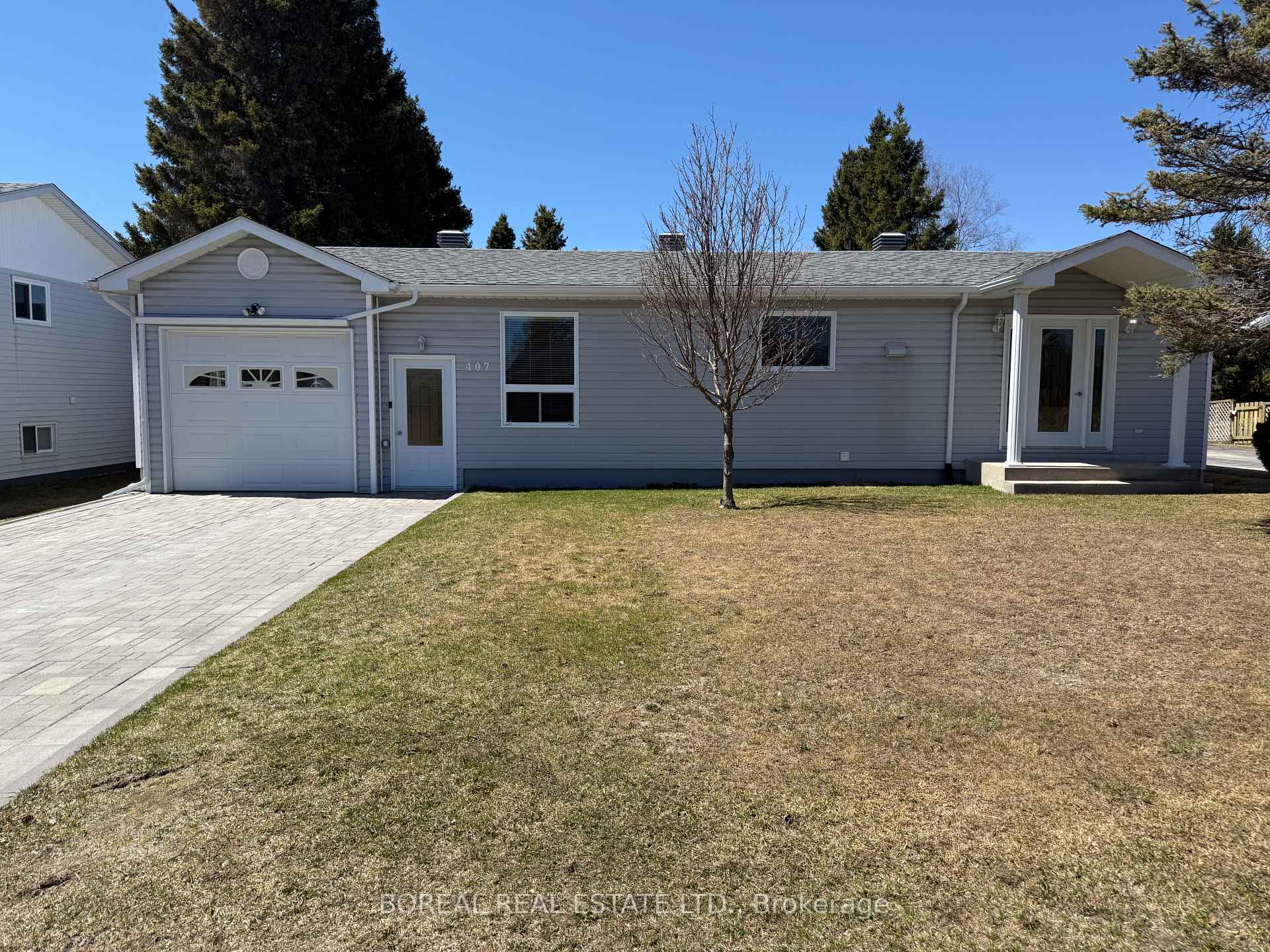 Photo 1 of 407 Fourteenth Avenue, Cochrane — HOMEH