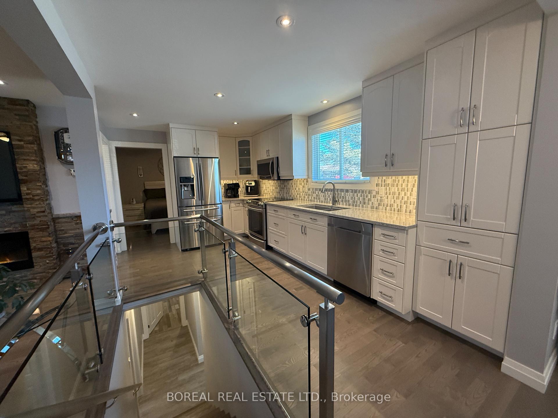 Photo 21 of 407 Fourteenth Avenue, Cochrane — HOMEH