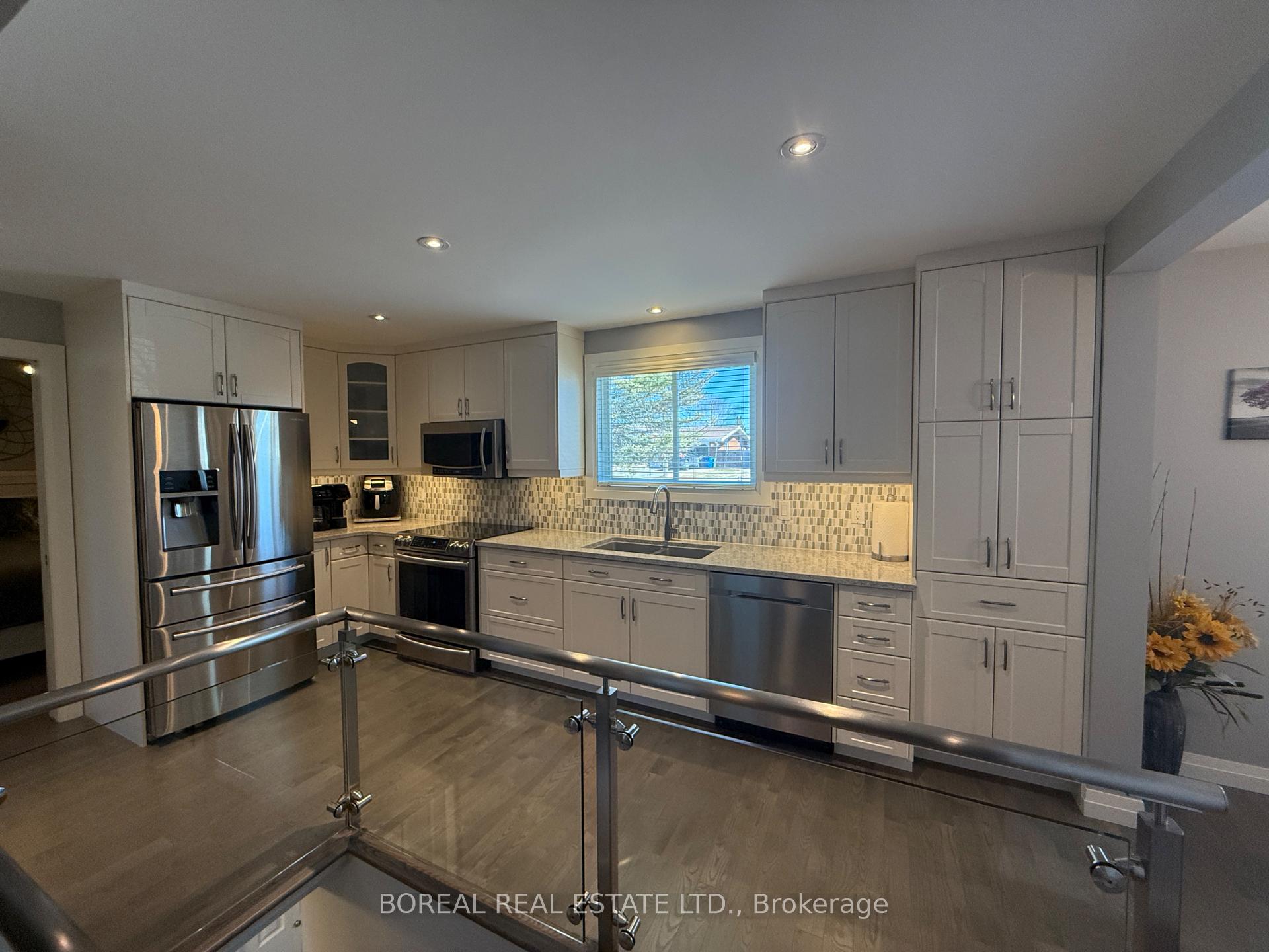 Photo 22 of 407 Fourteenth Avenue, Cochrane — HOMEH