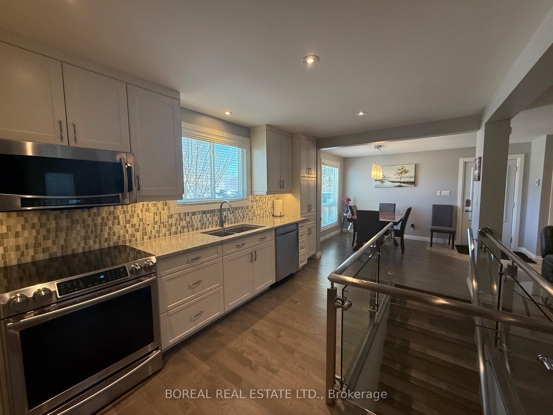 Photo 23 of 407 Fourteenth Avenue, Cochrane — HOMEH