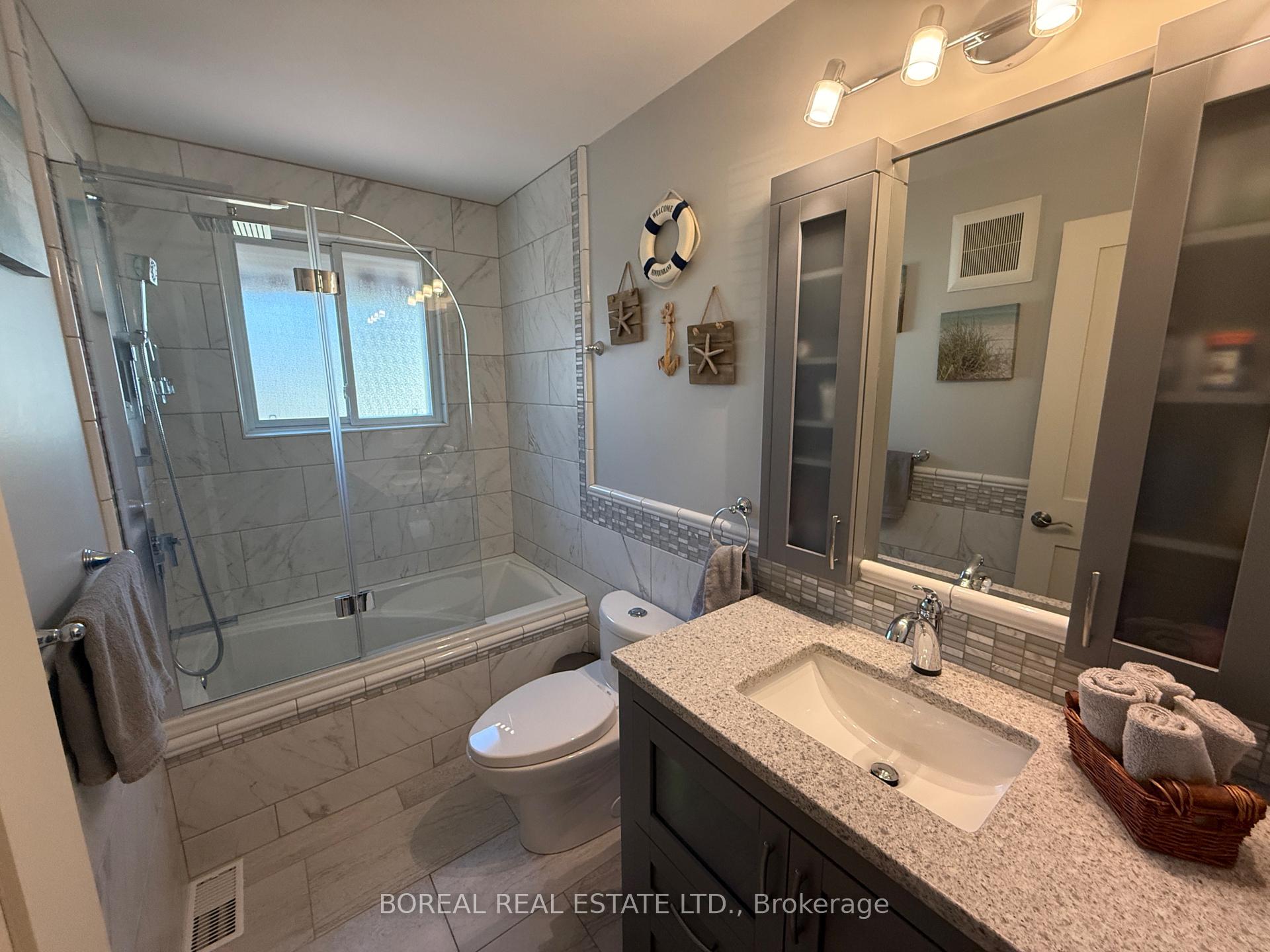 Photo 27 of 407 Fourteenth Avenue, Cochrane — HOMEH