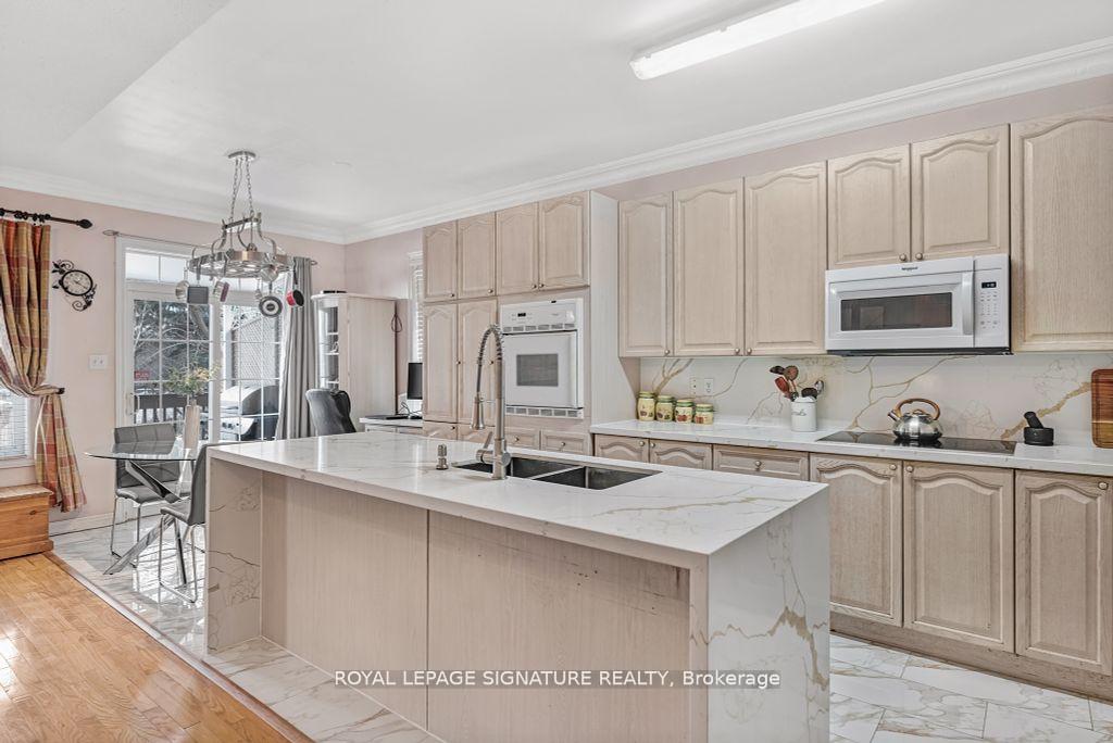 Photo 12 of 102 Pennyroyal Crescent, Brampton, Bramalea North Industrial — HOMEH