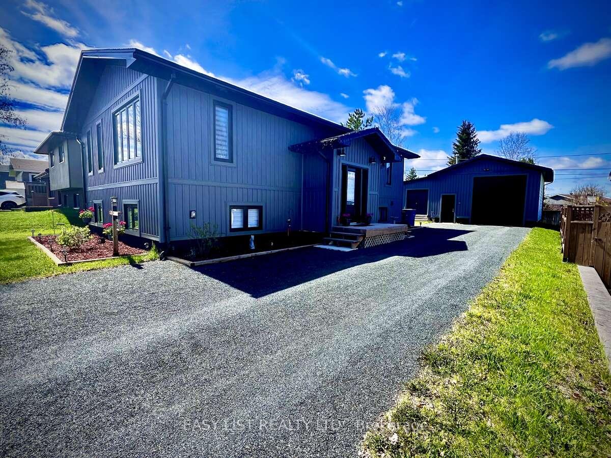 Photo 1 of 35 Algonquin Road, Cochrane — HOMEH
