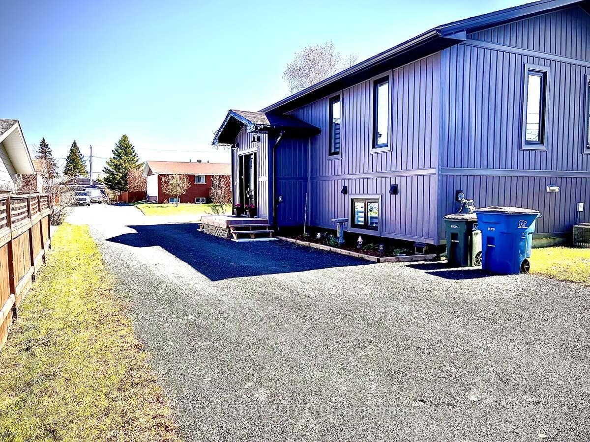 Photo 2 of 35 Algonquin Road, Cochrane — HOMEH