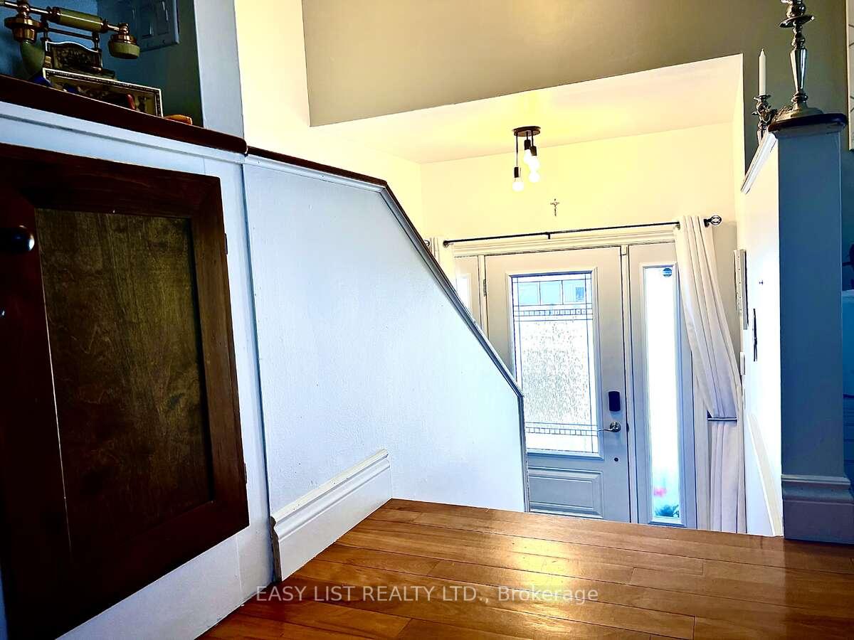 Photo 3 of 35 Algonquin Road, Cochrane — HOMEH