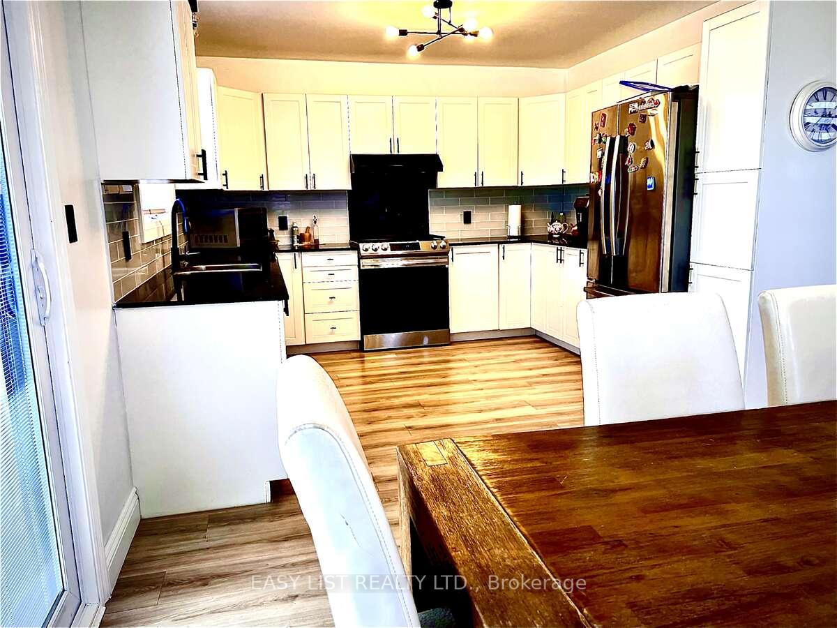 Photo 25 of 35 Algonquin Road, Cochrane — HOMEH
