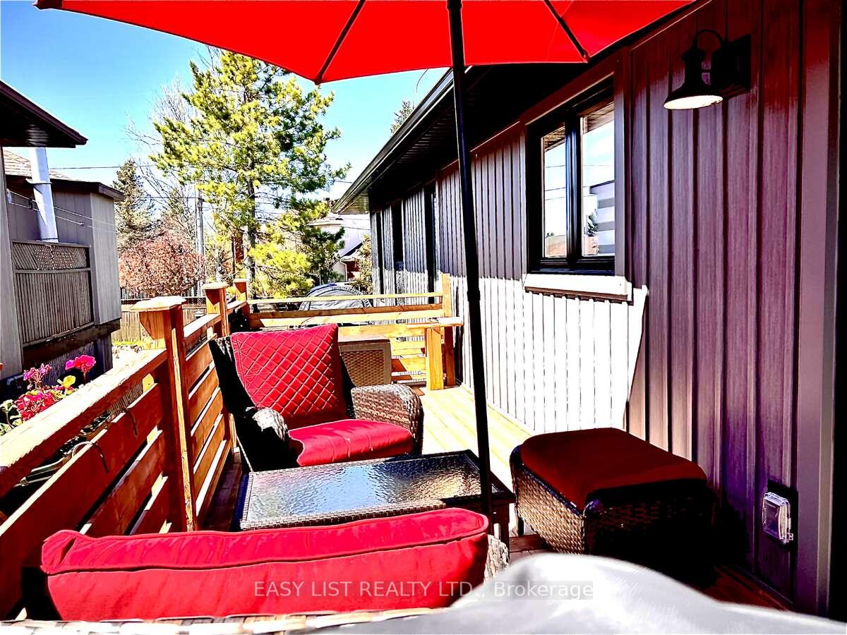 Photo 28 of 35 Algonquin Road, Cochrane — HOMEH