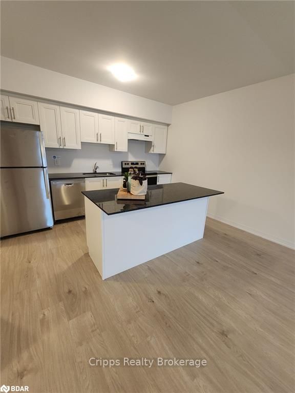 Photo 5 of Unit 404, 15 Kneeshaw Drive, Barrie, Rural Barrie Southeast — HOMEH