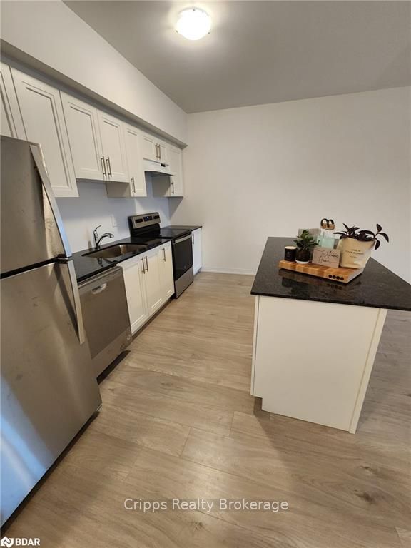 Photo 7 of Unit 404, 15 Kneeshaw Drive, Barrie, Rural Barrie Southeast — HOMEH