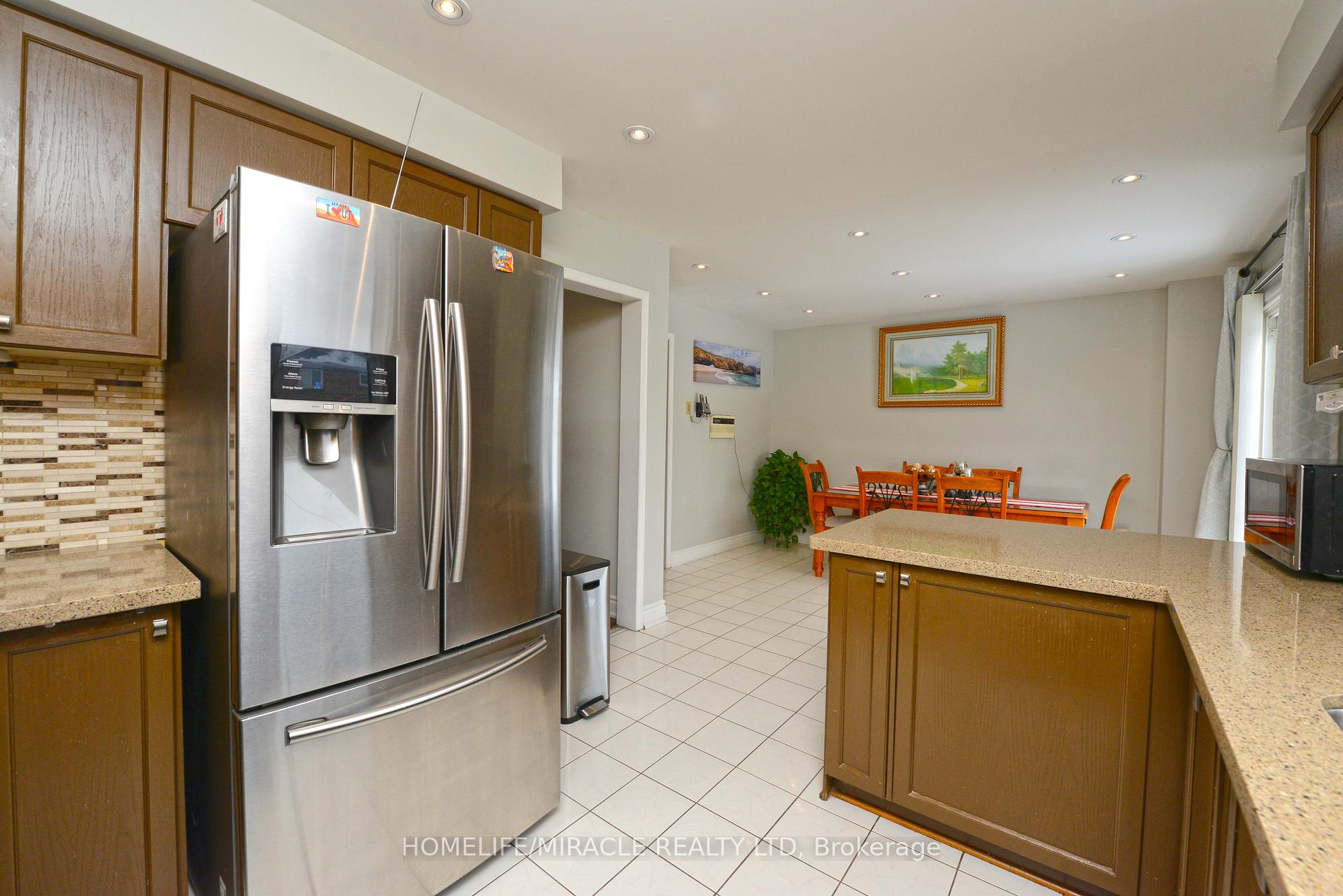 Photo 2 of 59 Michigan Avenue, Brampton, Fletcher's Creek South — HOMEH