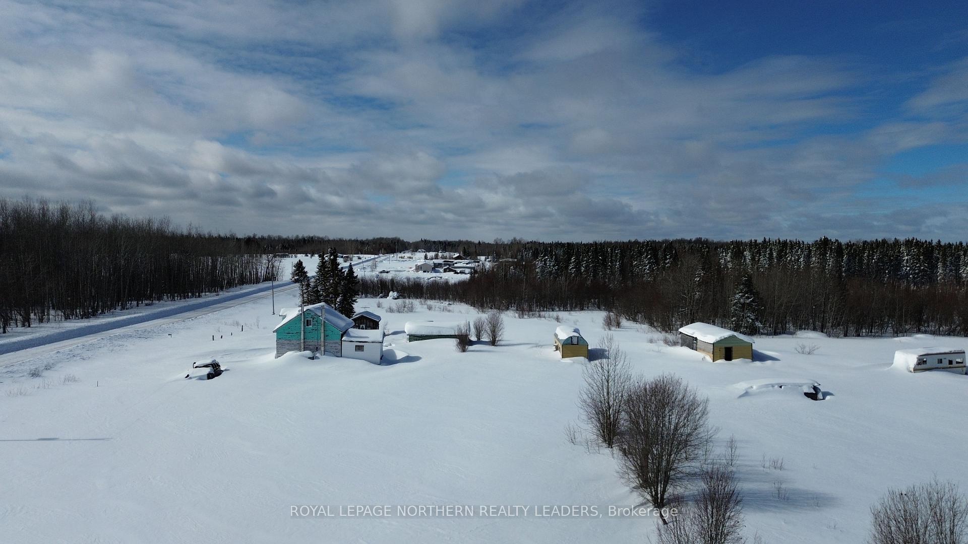 Photo 1 of 103 Hanna Road E, Cochrane — HOMEH
