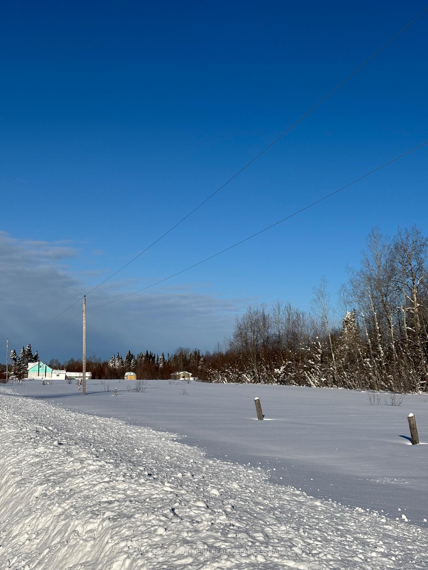 Photo 2 of 103 Hanna Road E, Cochrane — HOMEH