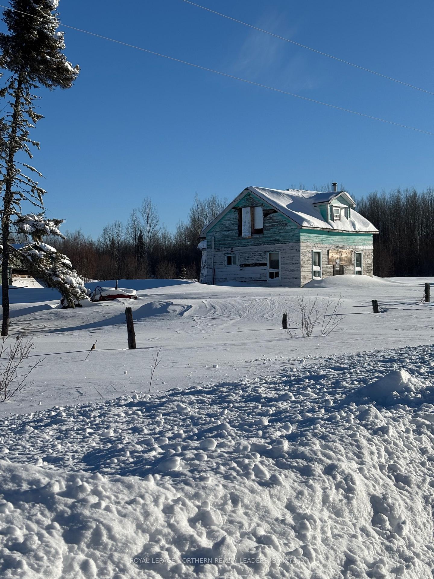 Photo 3 of 103 Hanna Road E, Cochrane — HOMEH