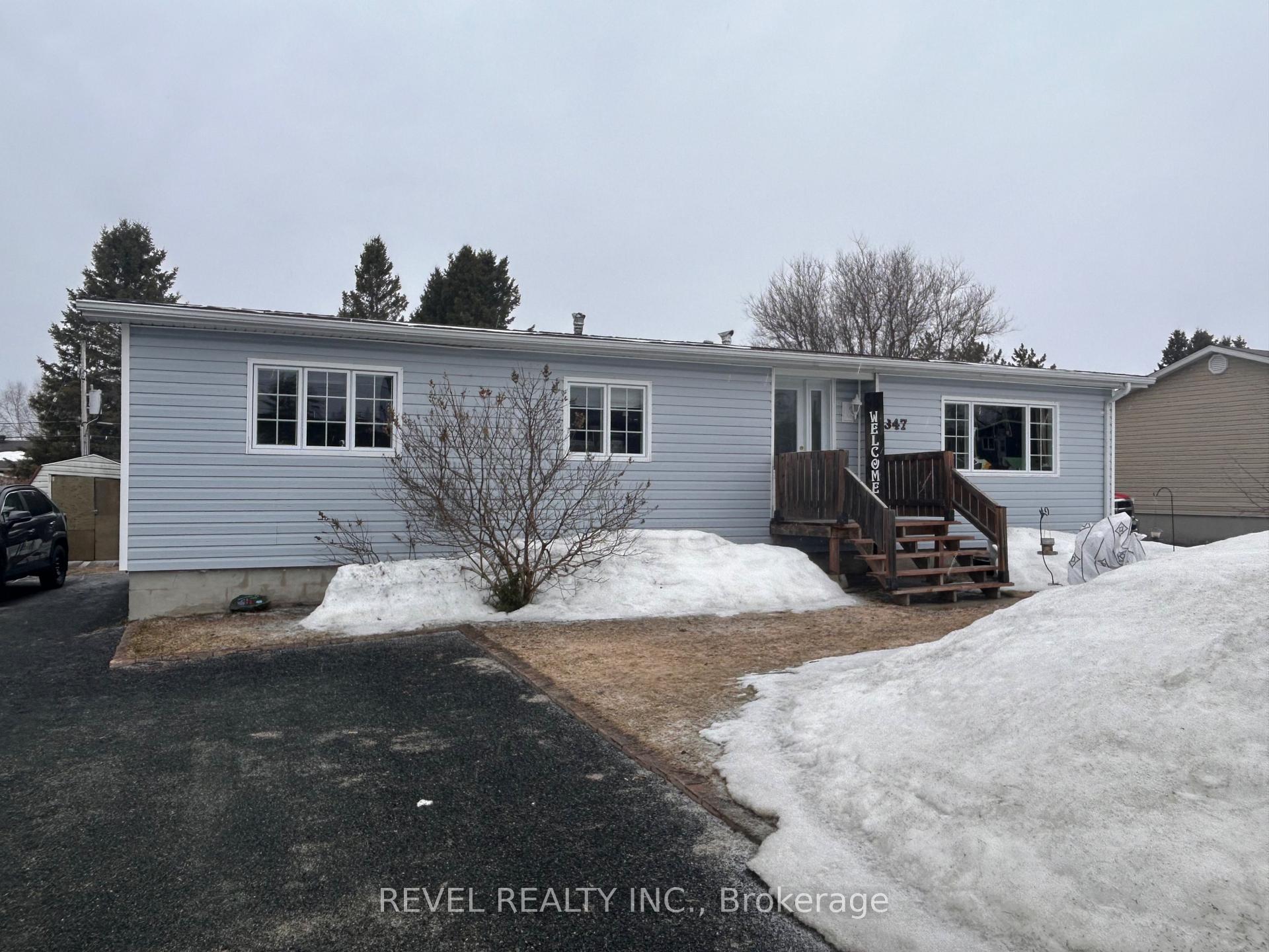 Photo 1 of 347 Seventeenth Avenue, Cochrane — HOMEH