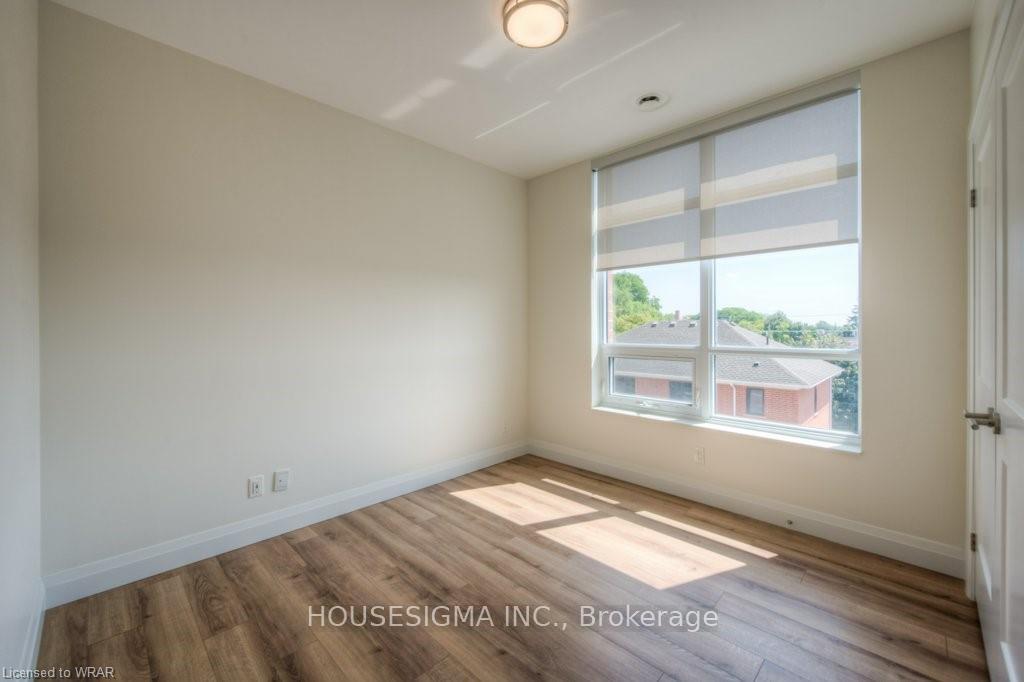 Photo 12 of Unit 410, 399 Queen Street S, Kitchener — HOMEH