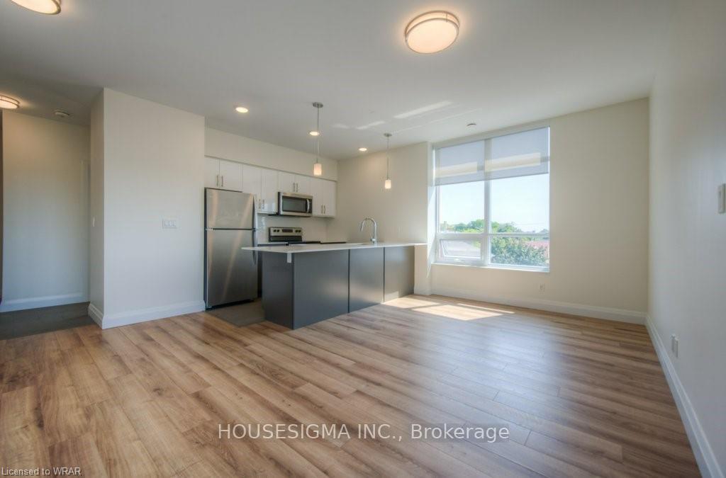 Photo 16 of Unit 410, 399 Queen Street S, Kitchener — HOMEH