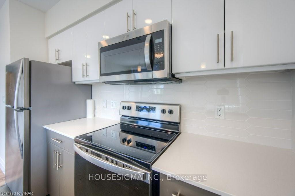 Photo 19 of Unit 410, 399 Queen Street S, Kitchener — HOMEH