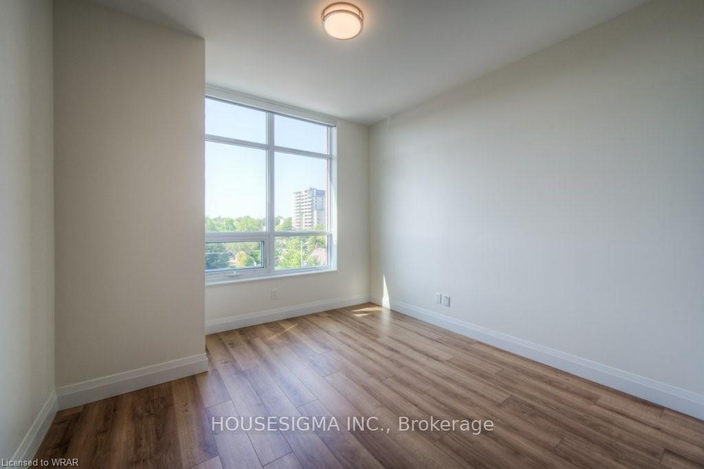 Photo 25 of Unit 410, 399 Queen Street S, Kitchener — HOMEH