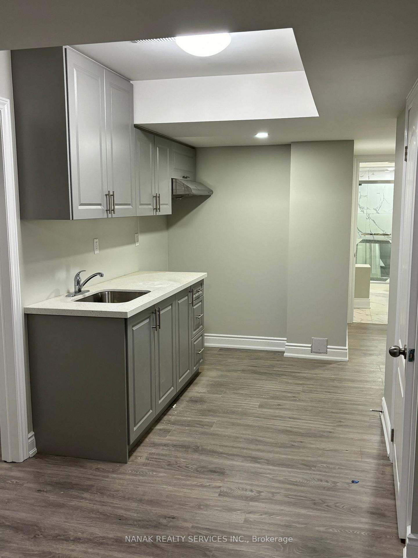 Front of Unit BSMT, 583 Queen Mary Drive