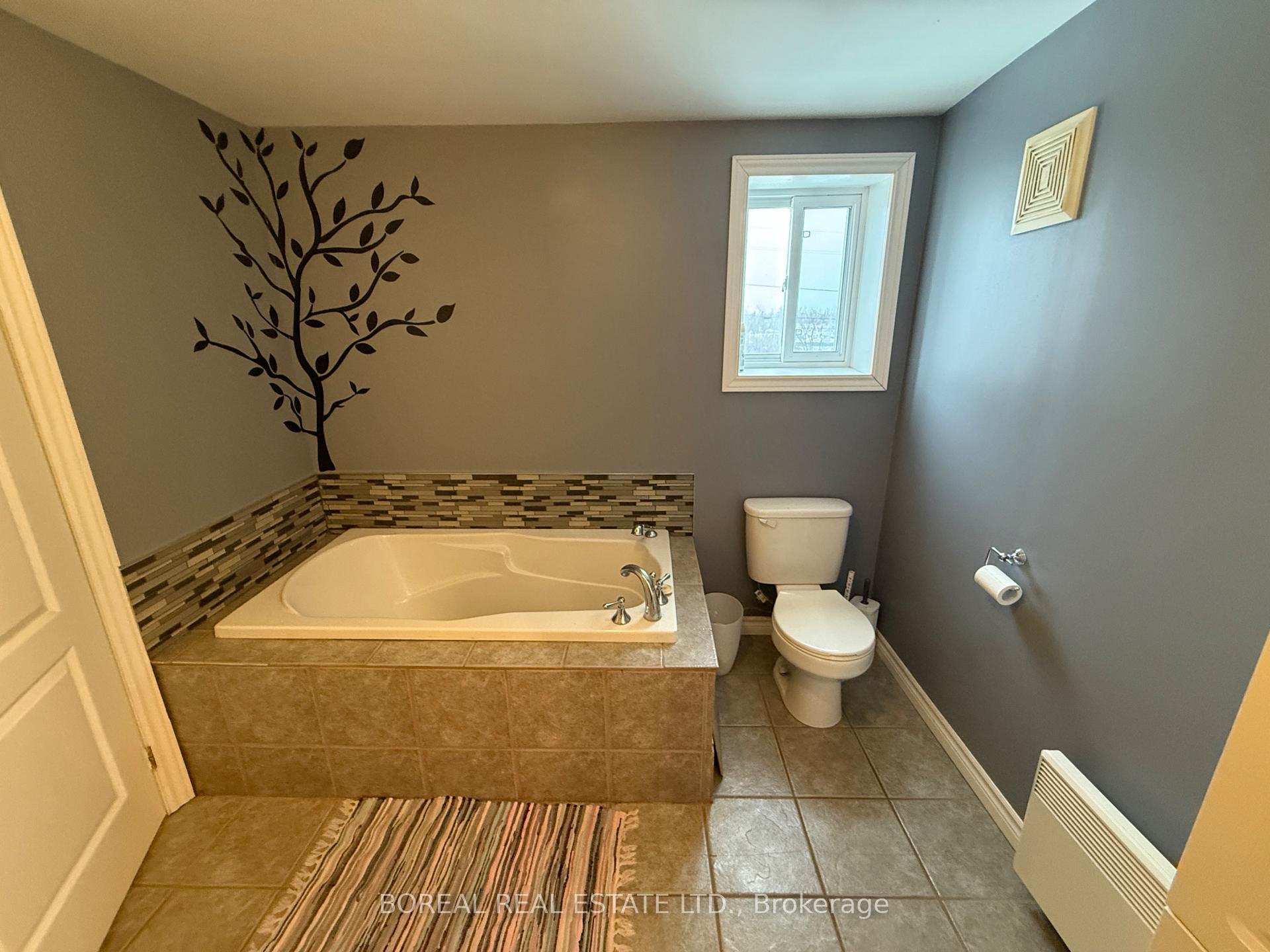Photo 25 of 211 Second Avenue, Cochrane — HOMEH