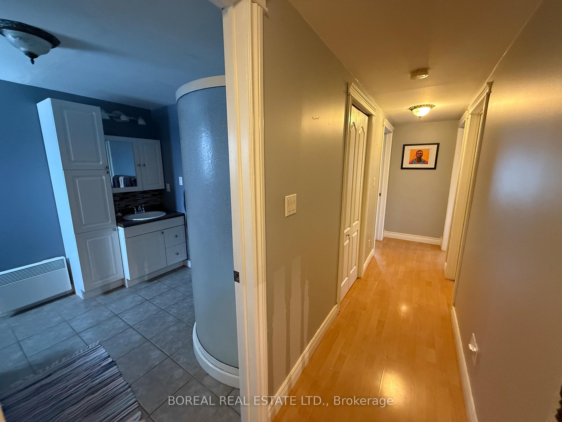 Photo 26 of 211 Second Avenue, Cochrane — HOMEH